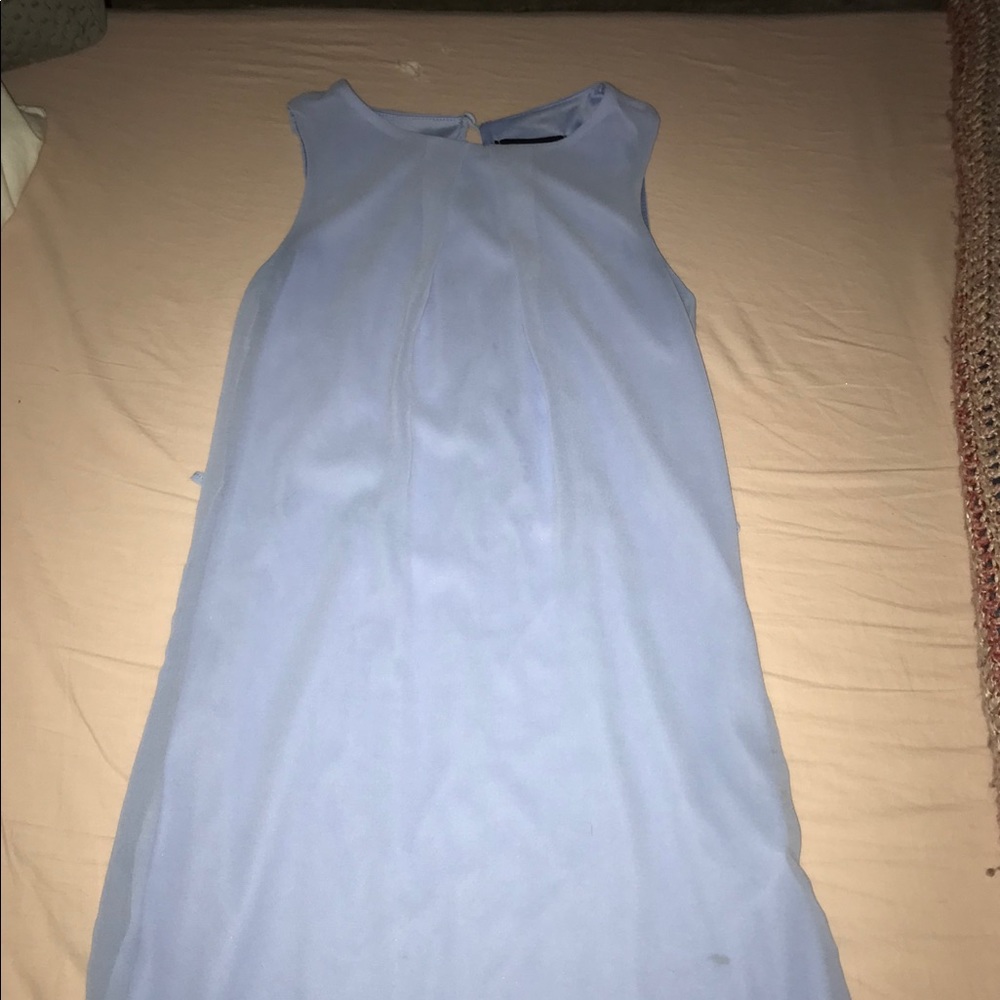 Blue dress w/ waist belt.